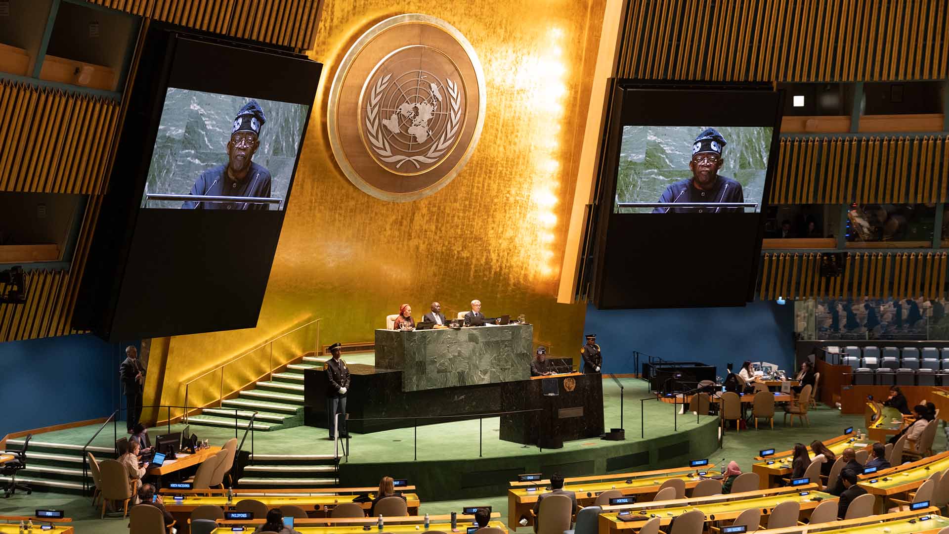 Nigeria's president, Bola Tinubu, speaks to wold leaders in the gold chamber of the United Nations General Assembly.